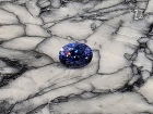 Faceted Benitoite .58 cts., Oval Cut, VVS