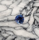 Faceted Benitoite, Round Cut, .66 cts., 5.1 mm, VVS