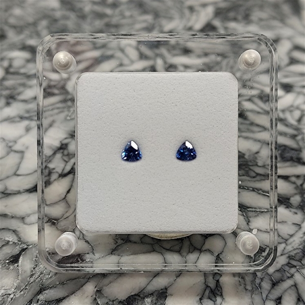 Pair of Faceted Benitoite Gemstones .32 ctw., Trillion Cut