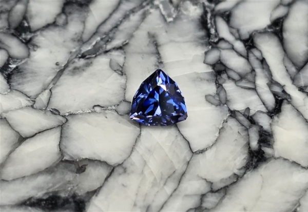 Faceted Benitoite, Round Cut, .74 cts., 5.2 mm, VVS/IF